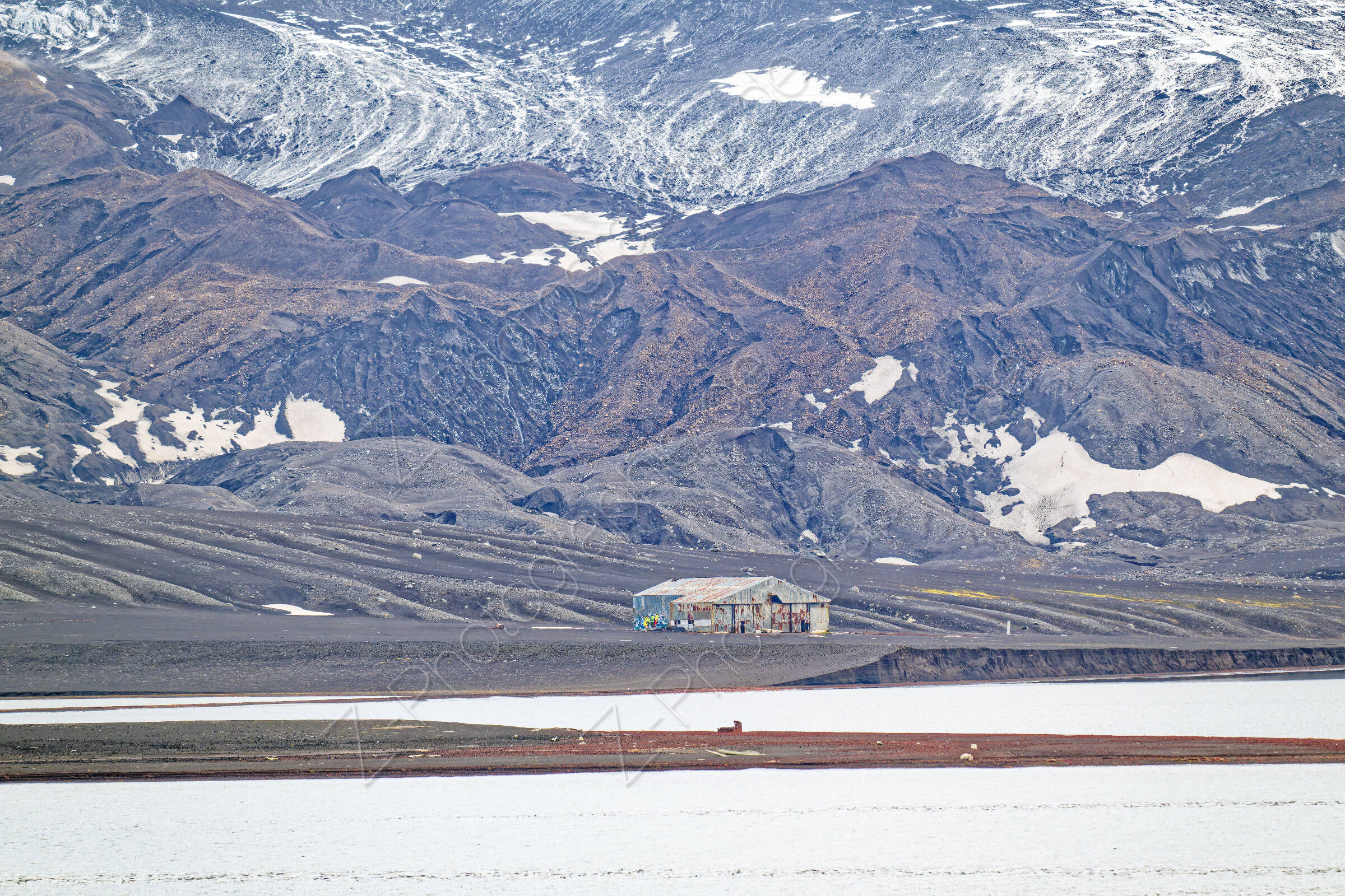Penfold Point with aircraft hangar, after incident with graffiti